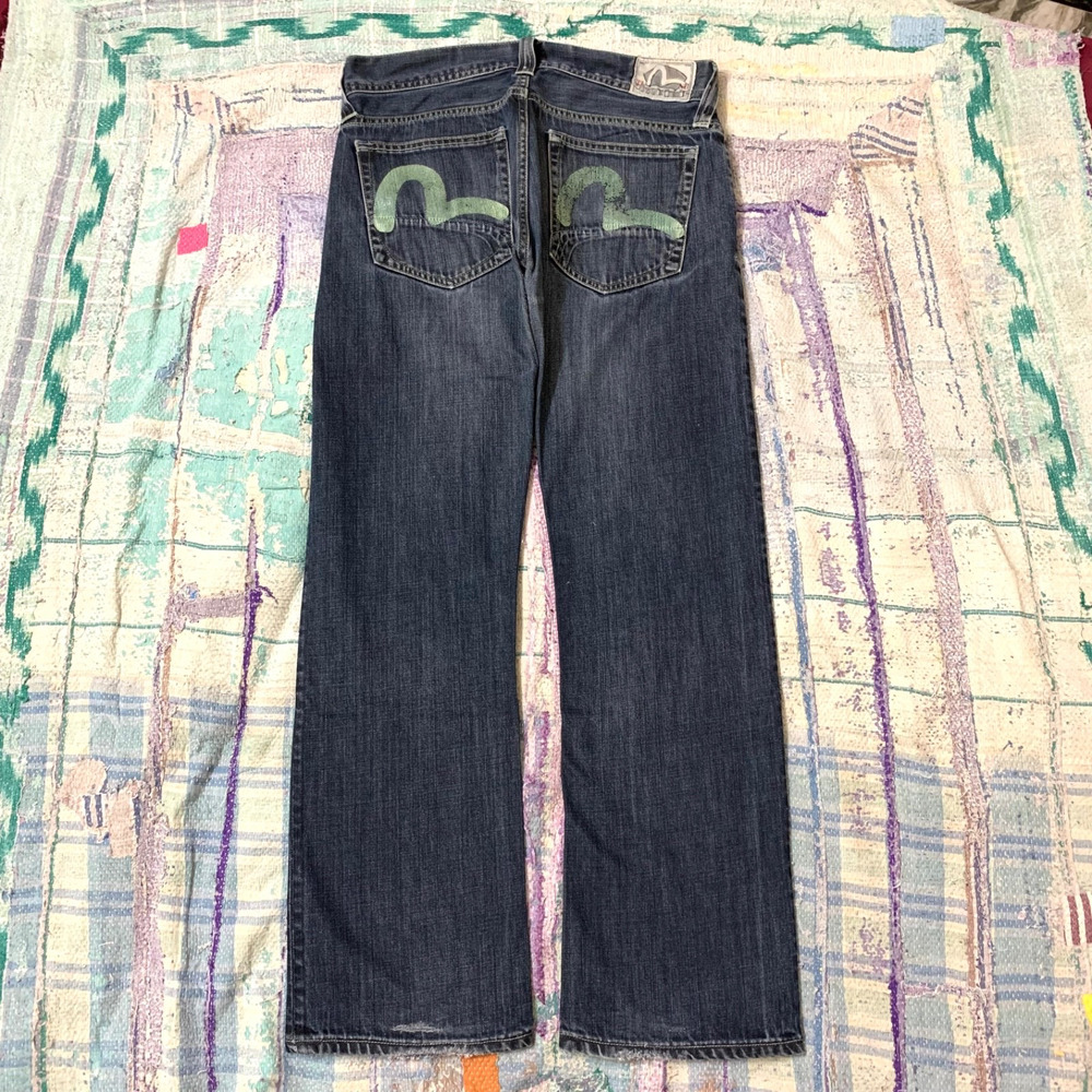 Y2K vintage Evisu x Puma bootcut jeans dark faded denim wash 34x31